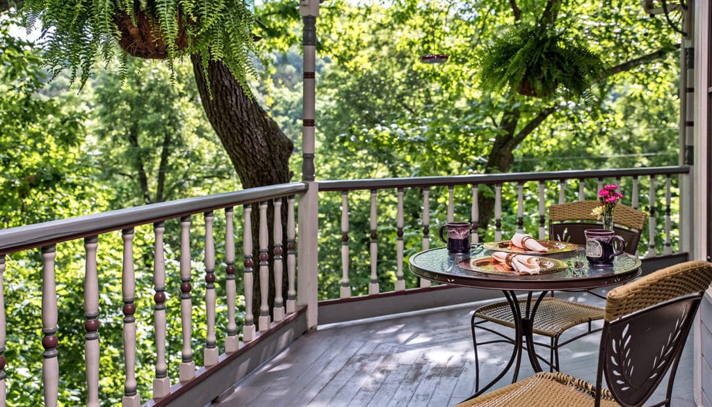 The Porch at our Eureka Springs Bed and Breakfast is the perfect place to relax after an afternoon in downtown Eureka Springs