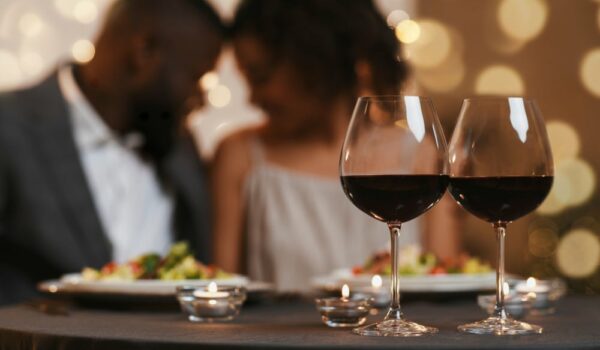 Black couple enjoying a romantic dinner at the best Eureka Springs Restaurants